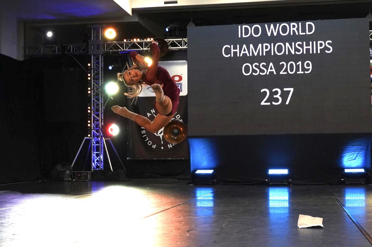 A Team UK dancer with a championship medal